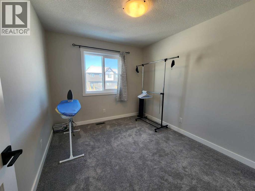 99 Edith Passage Nw, Calgary, Alberta  T3R 2B5 - Photo 35 - A2226472