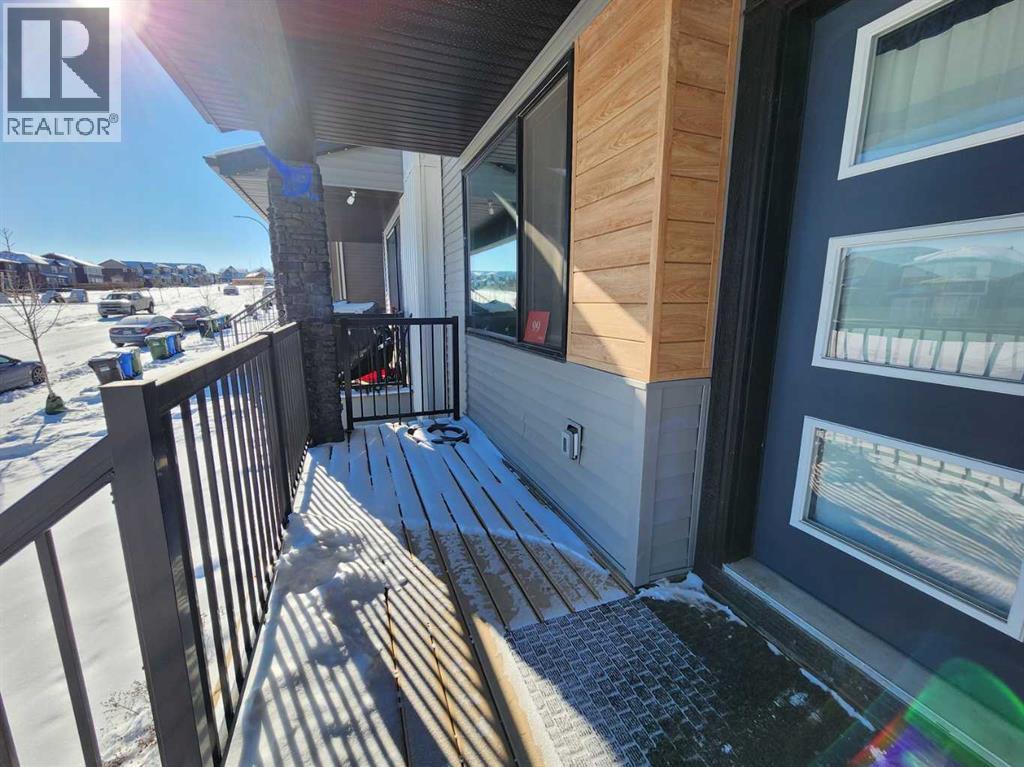 99 Edith Passage Nw, Calgary, Alberta  T3R 2B5 - Photo 2 - A2226472