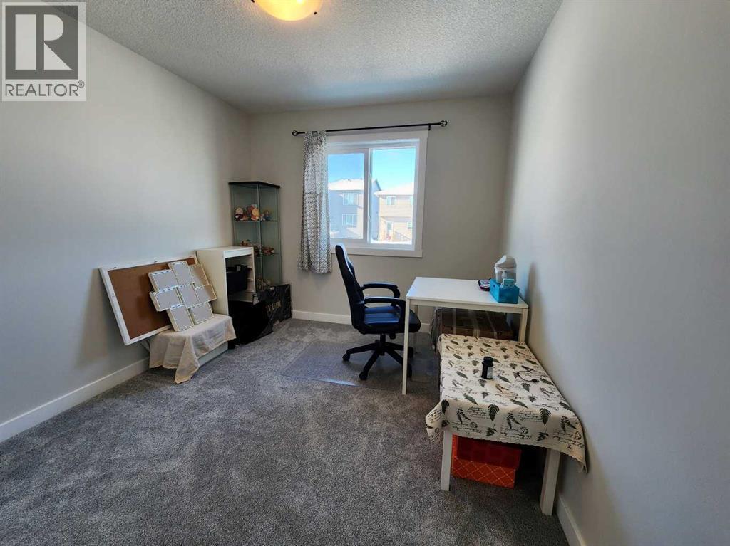 99 Edith Passage Nw, Calgary, Alberta  T3R 2B5 - Photo 31 - A2226472