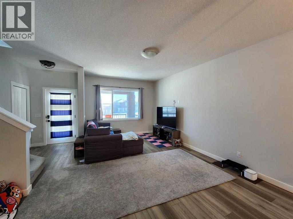 99 Edith Passage Nw, Calgary, Alberta  T3R 2B5 - Photo 6 - A2226472