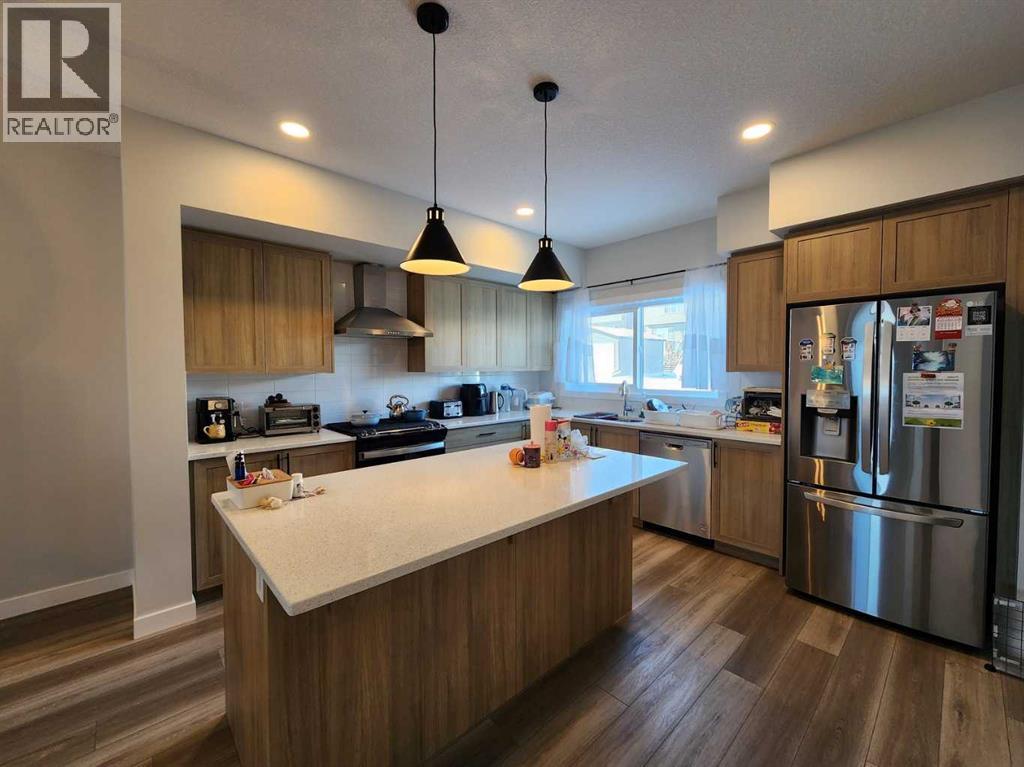 99 Edith Passage Nw, Calgary, Alberta  T3R 2B5 - Photo 9 - A2226472