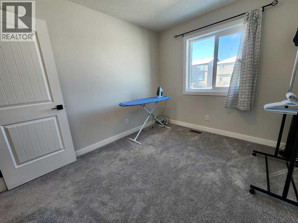 99 Edith Passage Nw, Calgary, Alberta  T3R 2B5 - Photo 36 - A2226472