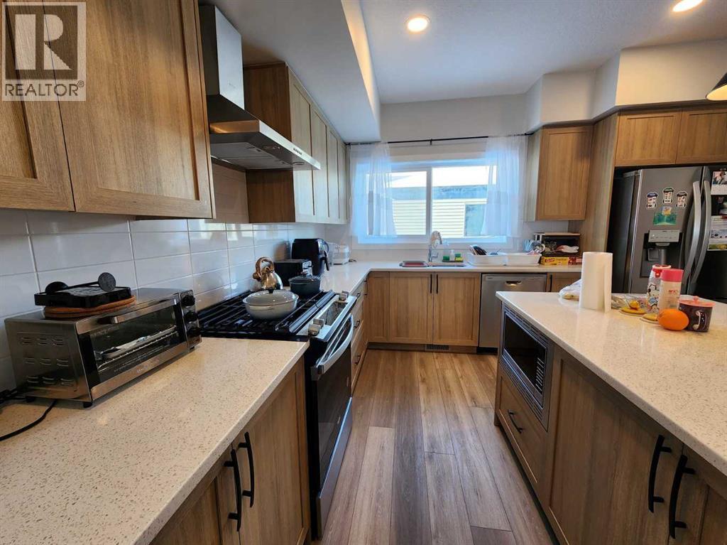 99 Edith Passage Nw, Calgary, Alberta  T3R 2B5 - Photo 12 - A2226472