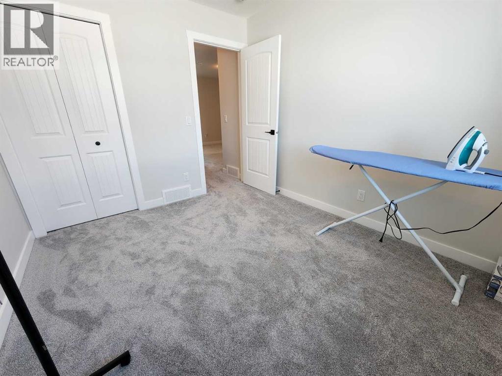 99 Edith Passage Nw, Calgary, Alberta  T3R 2B5 - Photo 37 - A2226472