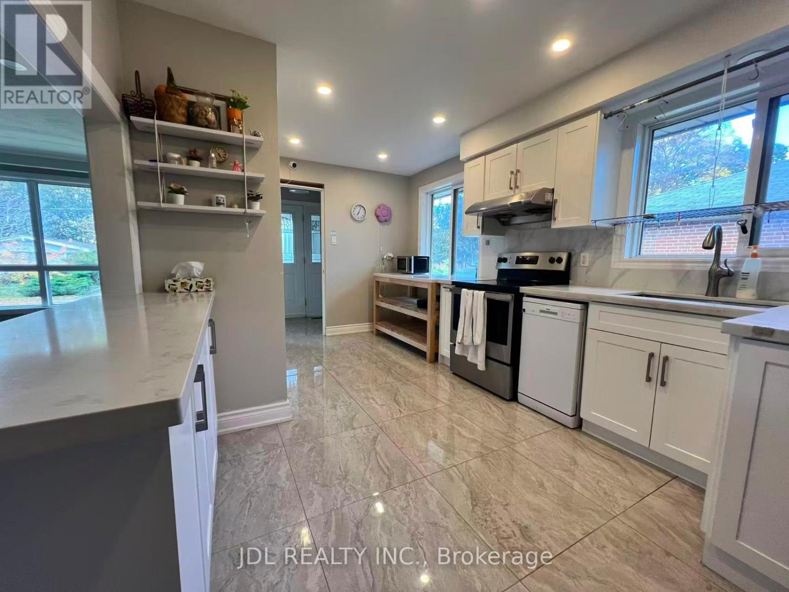 15 Summerglade Drive, Toronto (Agincourt South-Malvern West), Ontario  M1S 1W8 - Photo 6 - E12476051