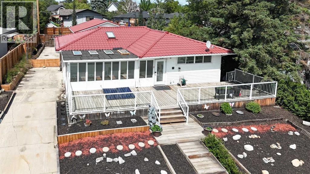 85 Malibou Road Sw, Calgary, Alberta  T2V 1X4 - Photo 2 - A2245468