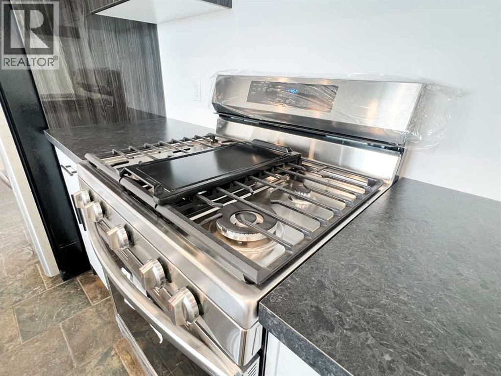 85 Malibou Road Sw, Calgary, Alberta  T2V 1X4 - Photo 21 - A2245468