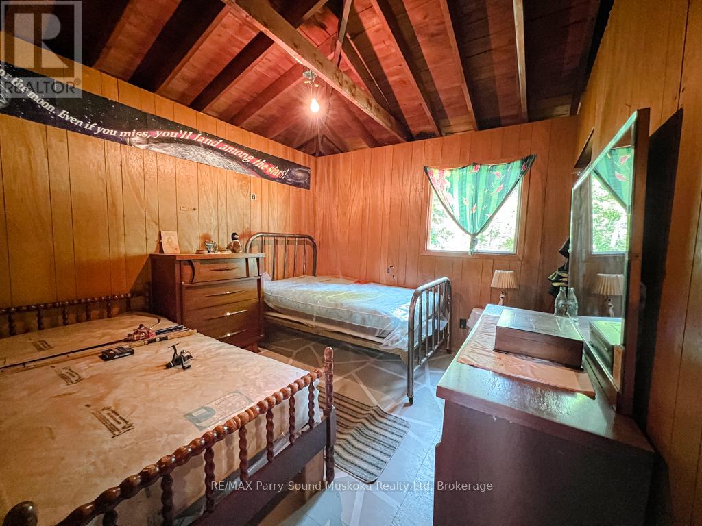 20 Golden Horseshoe Lane, Whitestone, Ontario  P0A 1G0 - Photo 25 - X12053152