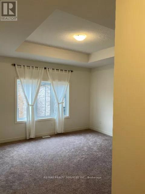 20 Truffle Court, Brampton, Ontario  L7A 5A6 - Photo 4 - W12476022
