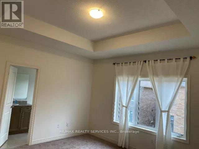 20 Truffle Court, Brampton, Ontario  L7A 5A6 - Photo 5 - W12476022