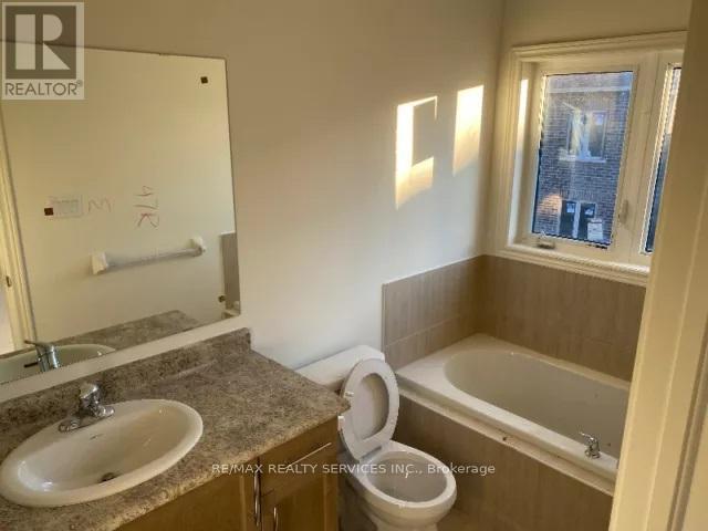 20 Truffle Court, Brampton, Ontario  L7A 5A6 - Photo 6 - W12476022
