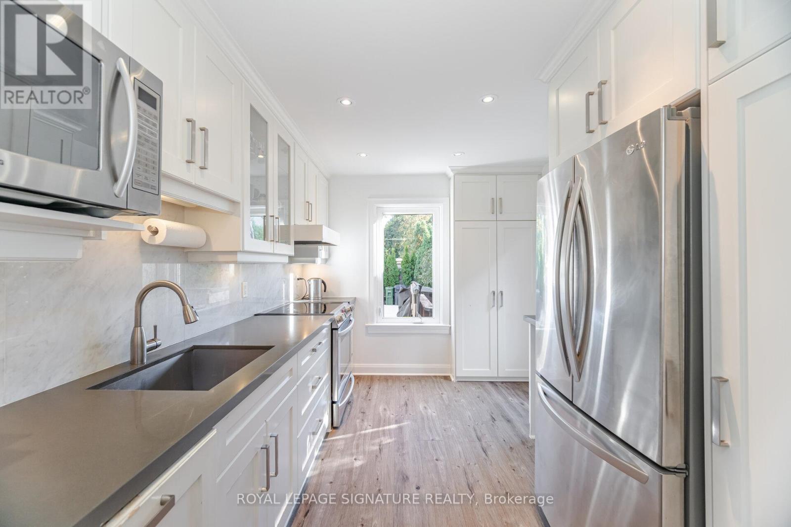 97 Deforest Road, Toronto, Ontario  M6S 1J6 - Photo 11 - W12475400