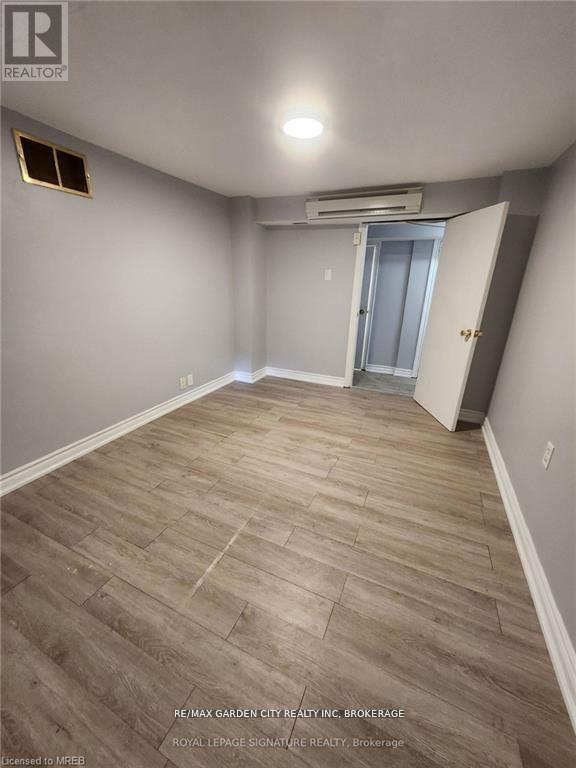 1 - 323 Queenston Street, St. Catharines, Ontario L2P 2X7 - Photo 11 - X12476446