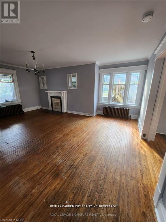 1 - 323 Queenston Street, St. Catharines, Ontario L2P 2X7 - Photo 2 - X12476446