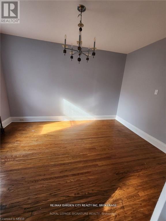 1 - 323 Queenston Street, St. Catharines, Ontario L2P 2X7 - Photo 3 - X12476446