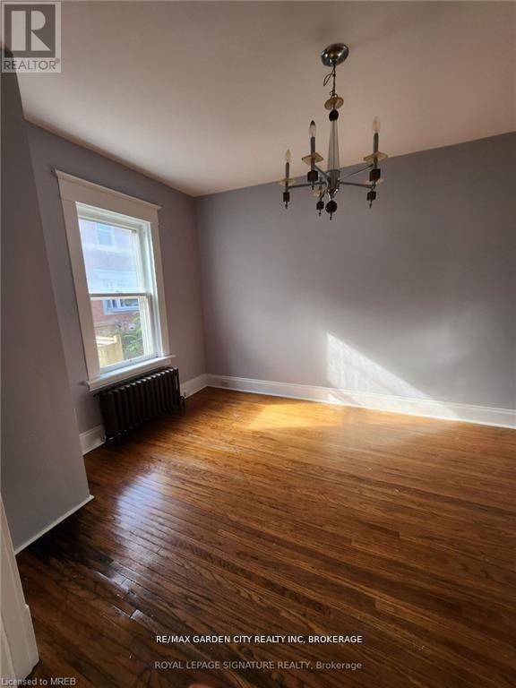 1 - 323 Queenston Street, St. Catharines, Ontario L2P 2X7 - Photo 4 - X12476446