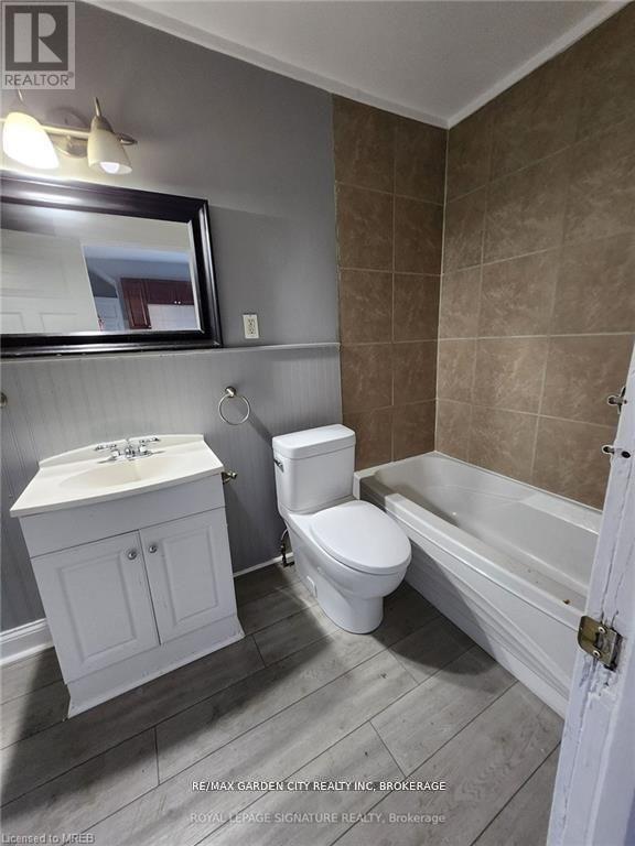 1 - 323 Queenston Street, St. Catharines, Ontario L2P 2X7 - Photo 7 - X12476446