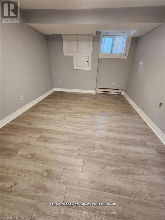 1 - 323 Queenston Street, St. Catharines, Ontario L2P 2X7 - Photo 9 - X12476446