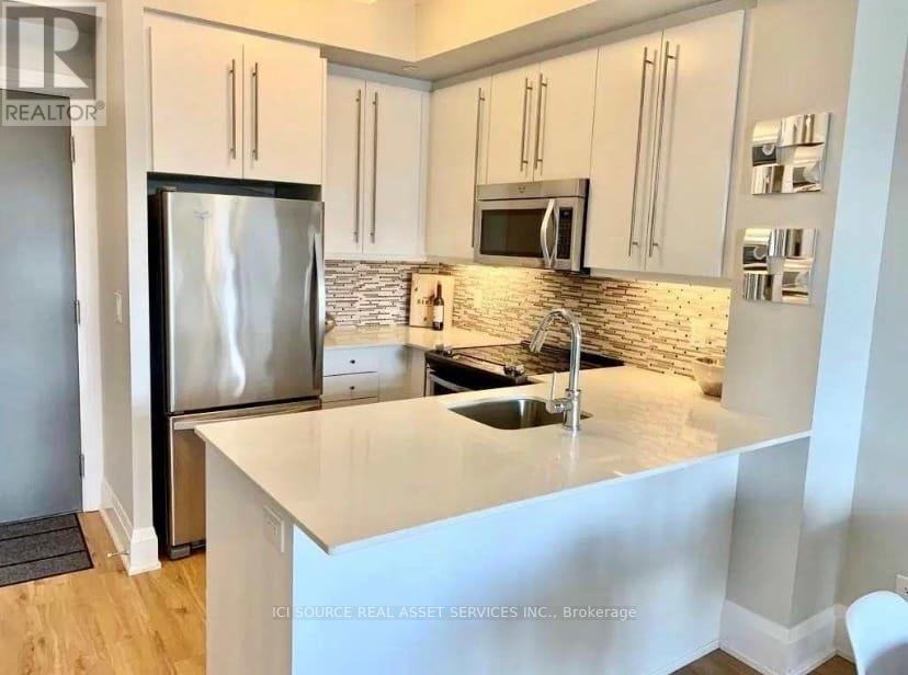 520 - 1 Old Mill Drive, Toronto, Ontario  M6S 0A1 - Photo 6 - W12476213
