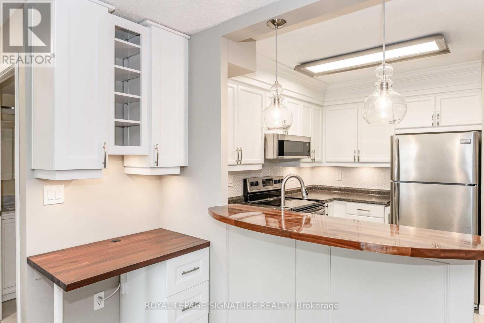 1013 - 2565 Erin Centre Boulevard, Mississauga, Ontario  L5M 6Z8 - Photo 4 - W12476236