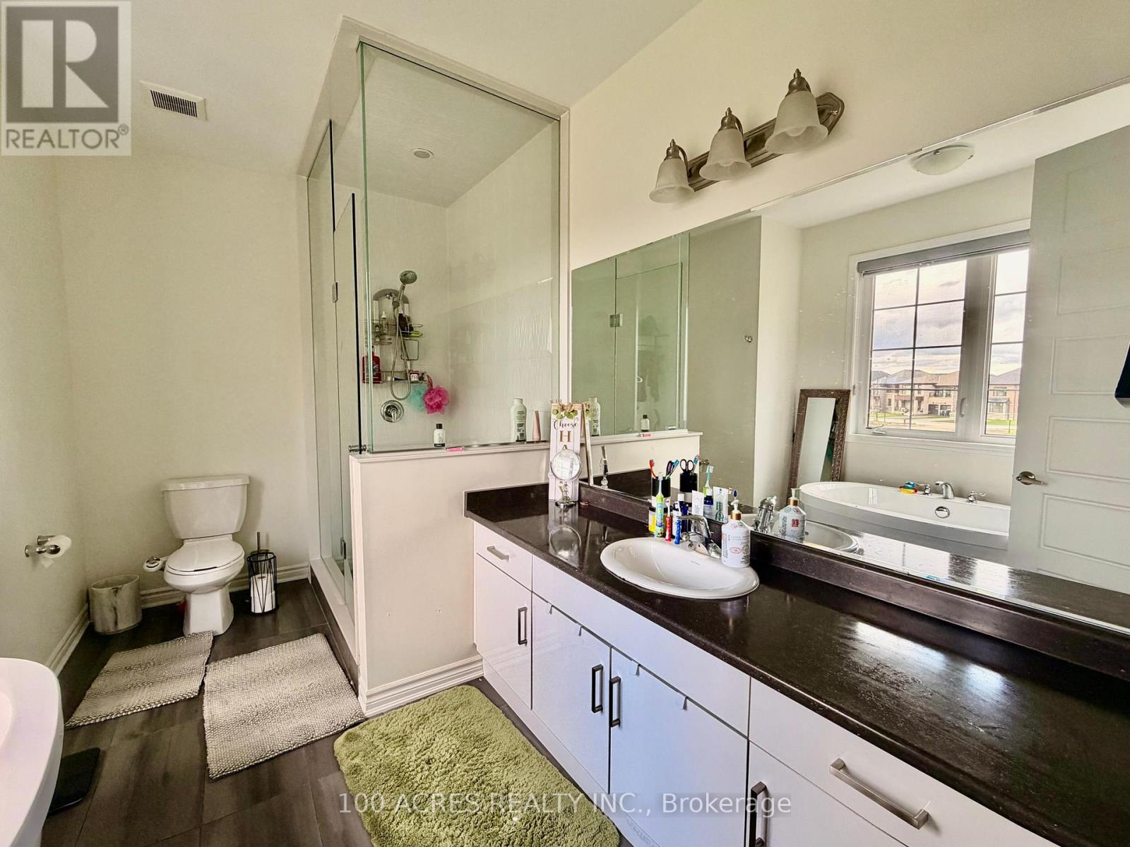 63 Eberly Woods Drive, Caledon, Ontario  L7C 4J3 - Photo 8 - W12476270
