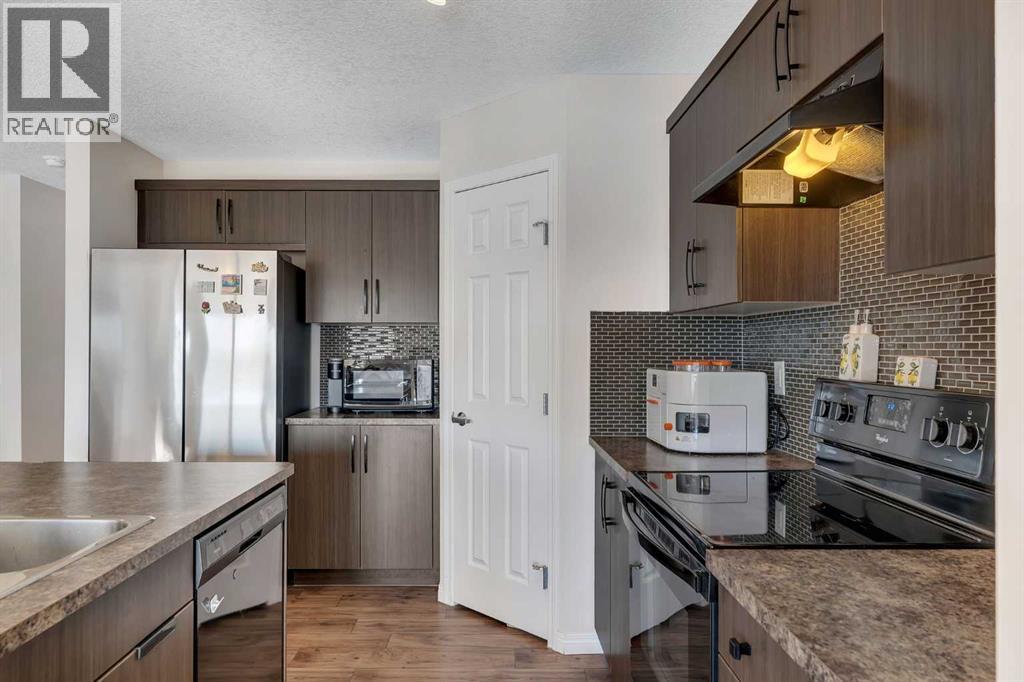 209 Hillcrest Square Sw, Airdrie, Alberta  T4B 4J1 - Photo 9 - A2266017