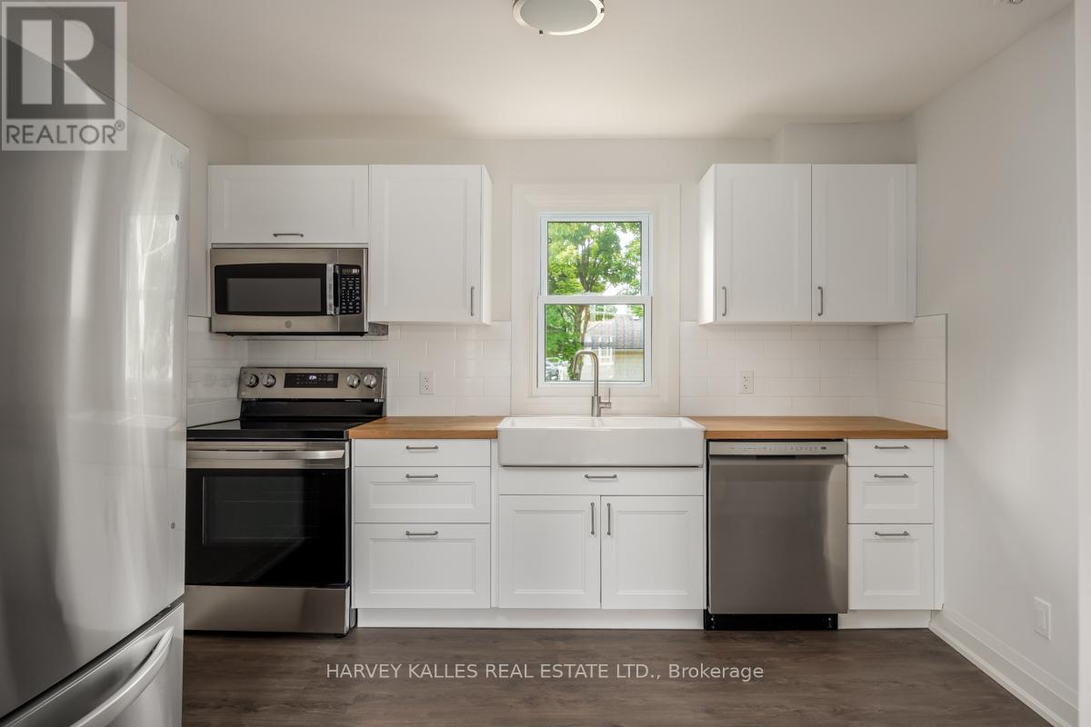 129 Major Mackenzie Drive E, Richmond Hill, Ontario  L4C 1H2 - Photo 9 - N12476508