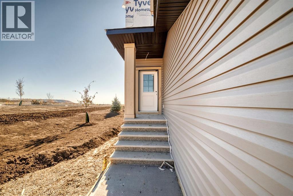 524 Heritage Boulevard, Cochrane, Alberta  T4C 2J8 - Photo 2 - A2265581