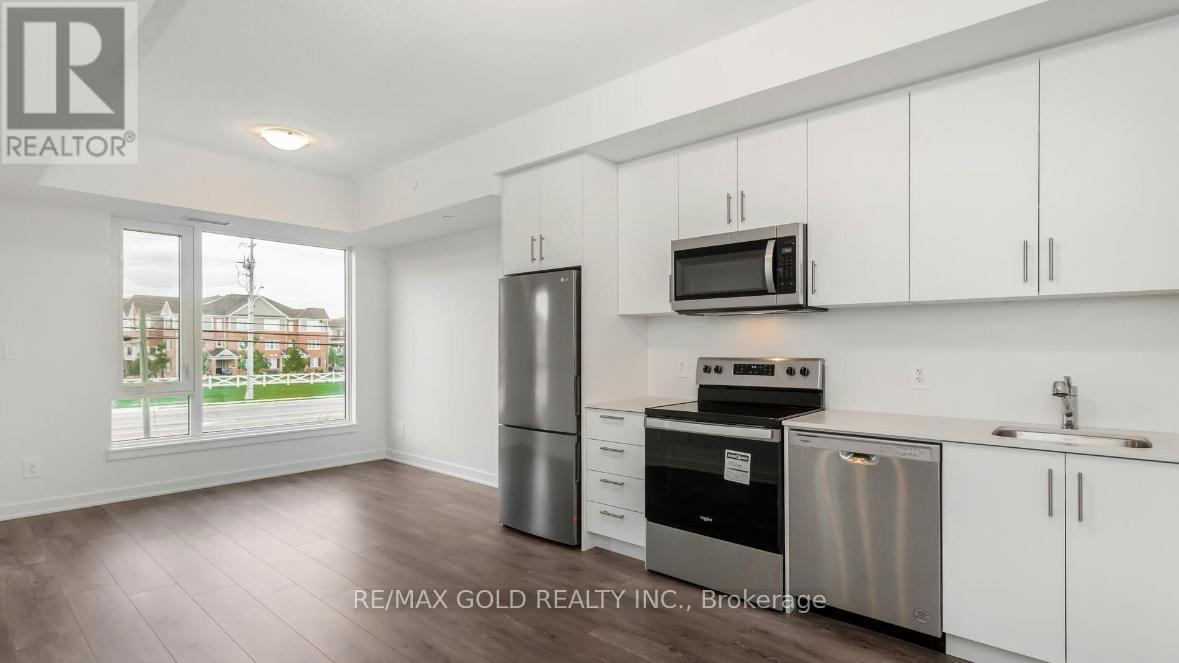 211 - 1440 Clarriage Court, Milton, Ontario  L9E 1B3 - Photo 3 - W12476770