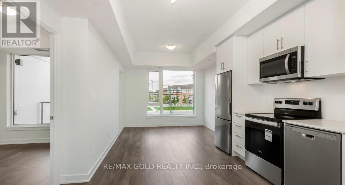 211 - 1440 Clarriage Court, Milton, Ontario  L9E 1B3 - Photo 4 - W12476770