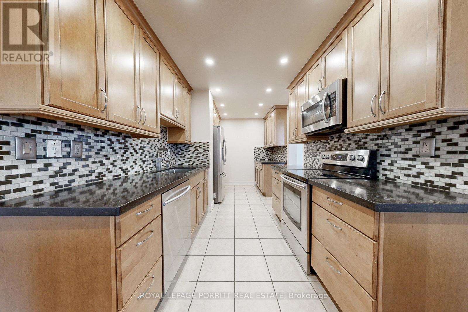2007 - 1515 Lakeshore Road E, Mississauga, Ontario  L5E 3E2 - Photo 11 - W12476963