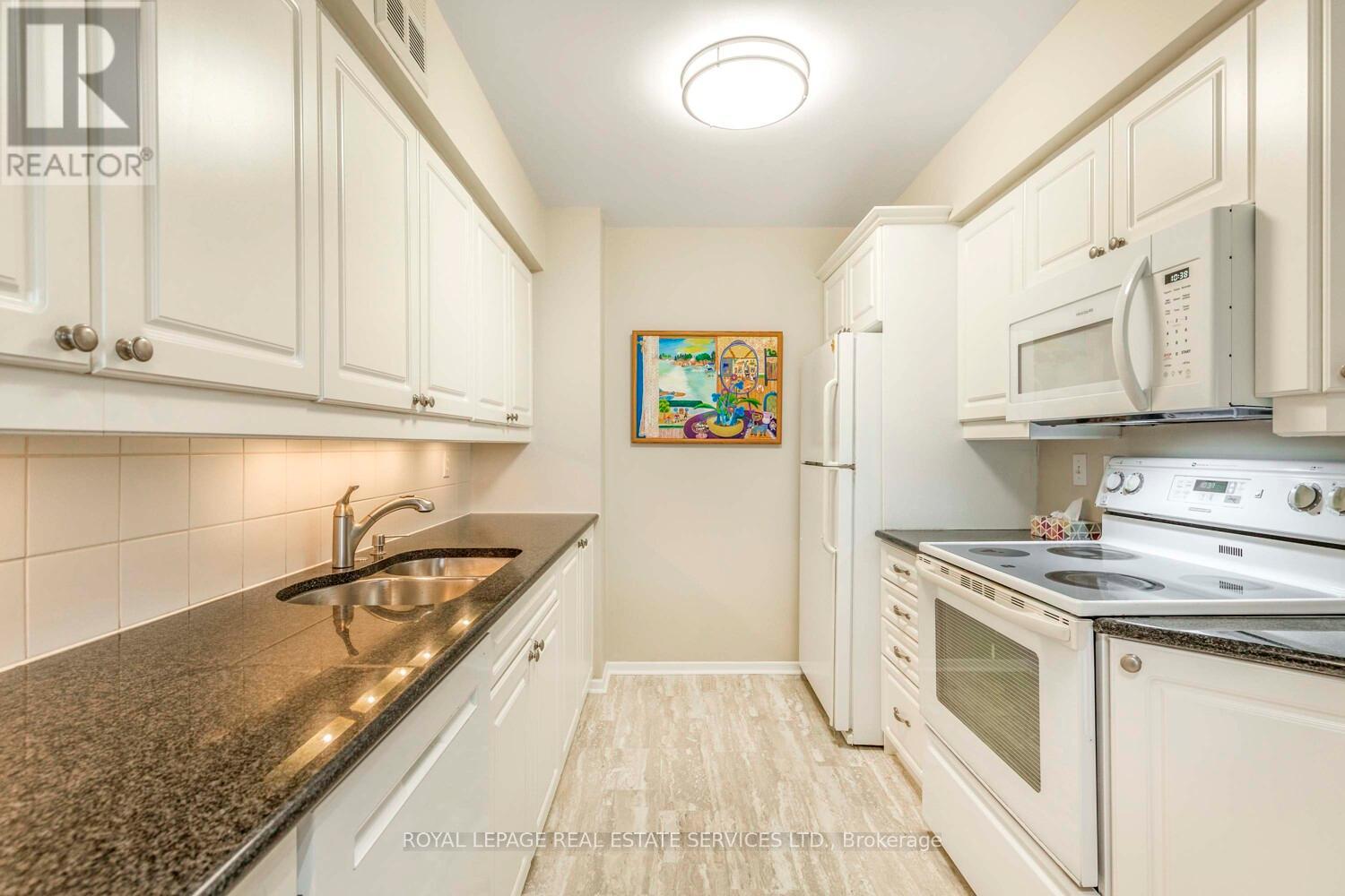 2805 - 1300 Islington Ave Crescent, Toronto, Ontario  M9A 5C4 - Photo 4 - W12477106