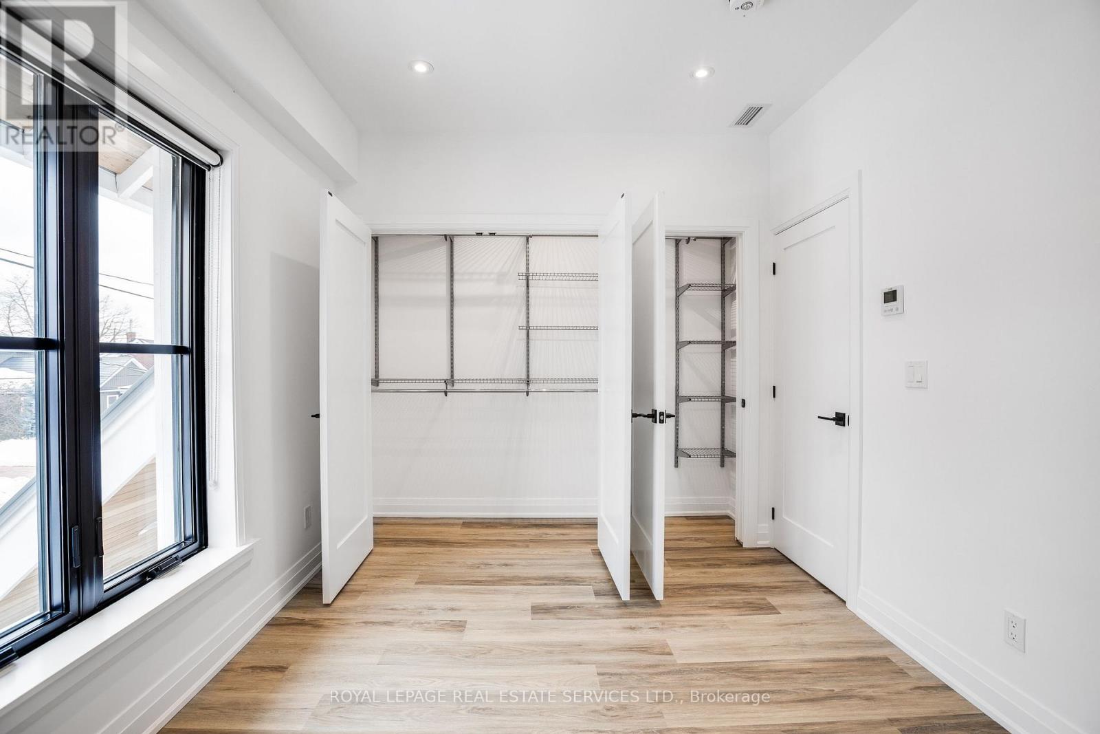 18 Milton Street, Toronto, Ontario  M8Y 2X5 - Photo 11 - W12477143