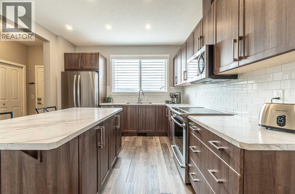 290 Belmont Heath Sw, Calgary, Alberta  T2X 4N3 - Photo 4 - A2252646