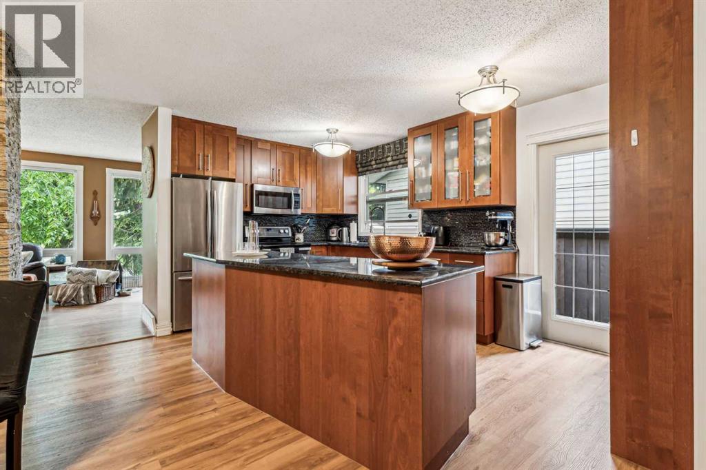 220 72 Avenue Ne, Calgary, Alberta  T2K 0N9 - Photo 12 - A2216457