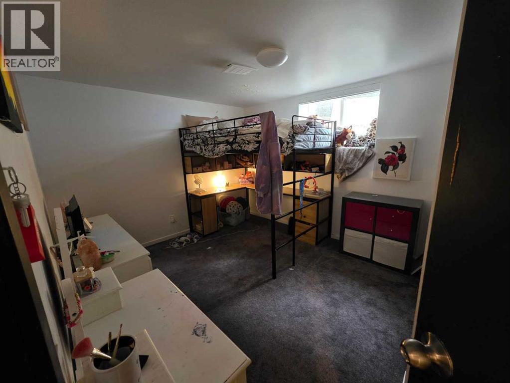 59 Brookpark Crescent Sw, Calgary, Alberta  T2W 2W6 - Photo 25 - A2251444