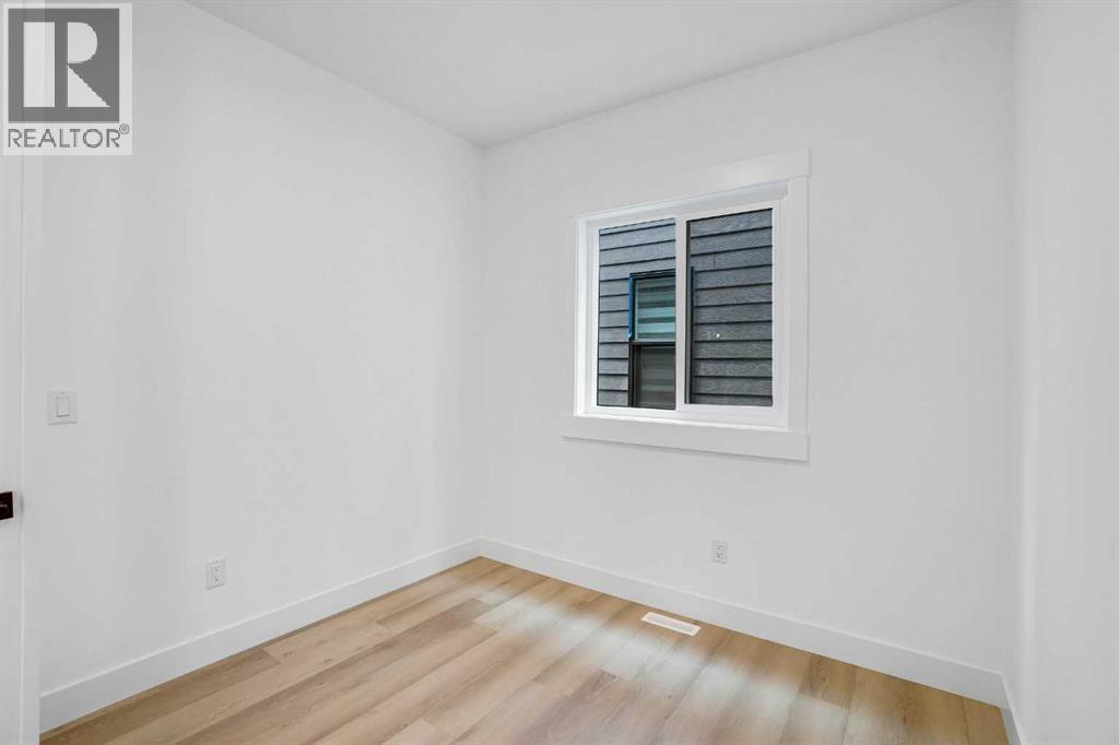 27 Heritage Close, Cochrane, Alberta  T4C 3G8 - Photo 16 - A2266388