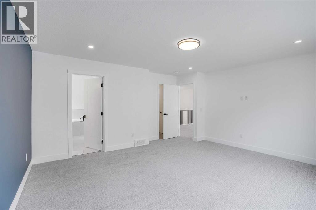 27 Heritage Close, Cochrane, Alberta  T4C 3G8 - Photo 21 - A2266388