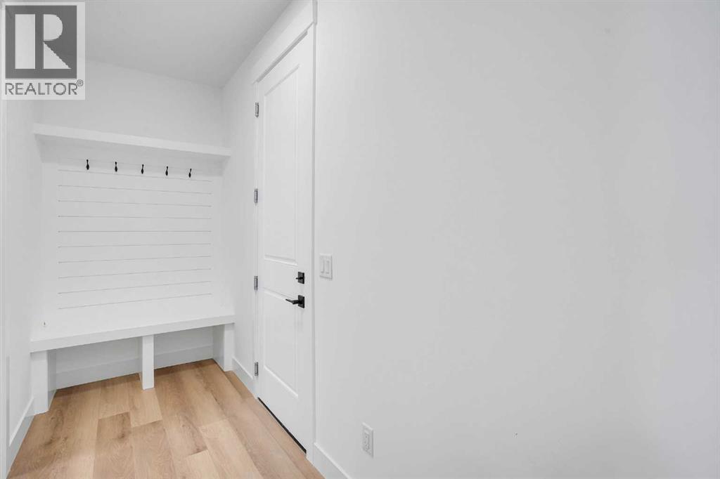 27 Heritage Close, Cochrane, Alberta  T4C 3G8 - Photo 4 - A2266388