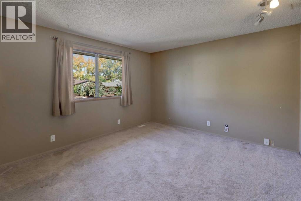 324 Ranchview Court Nw, Calgary, Alberta  T3G 1A6 - Photo 15 - A2259623