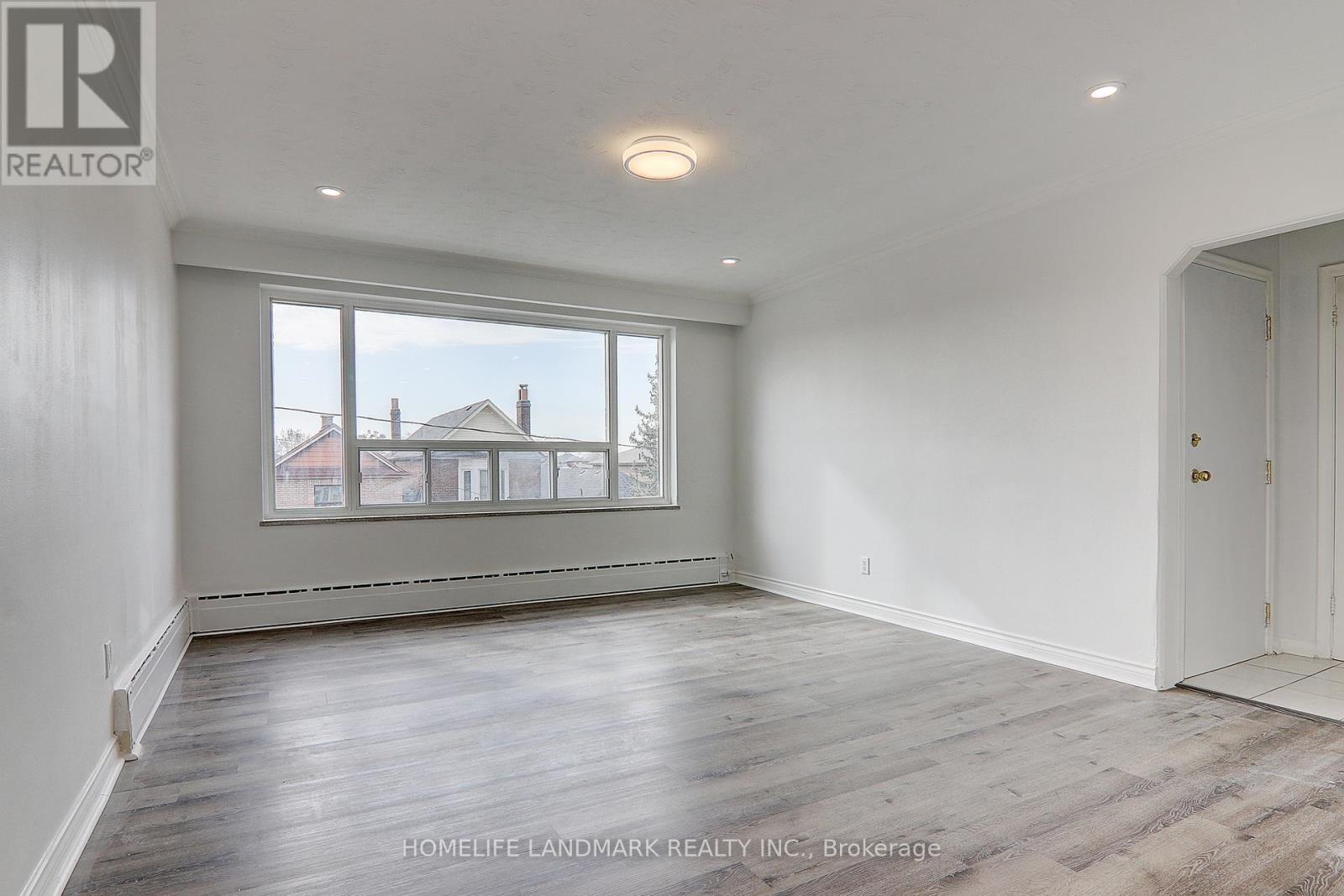 2(Upper - 8 Hanson Road, Toronto, Ontario  M6E 1T3 - Photo 4 - C12477462
