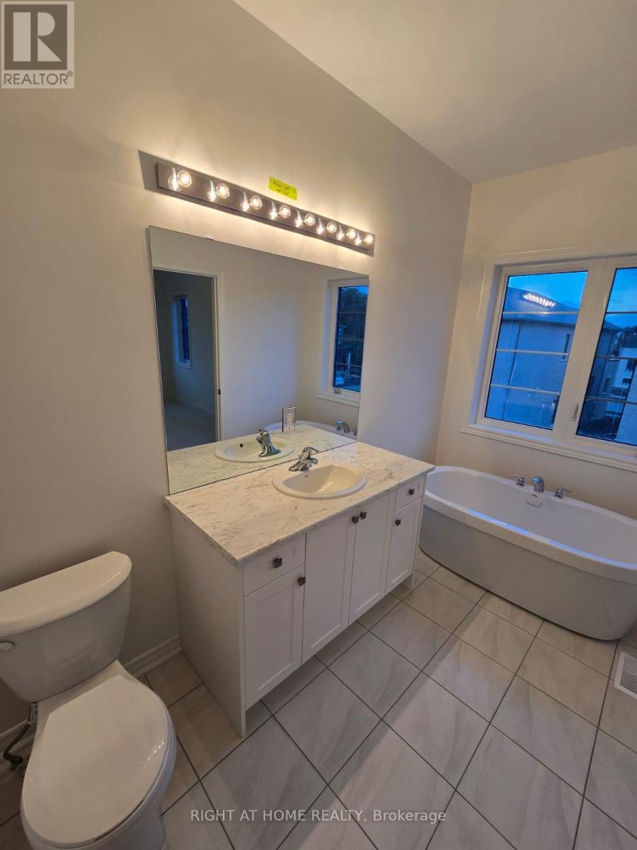 60 Mcgowan Drive, Whitby, Ontario  L1P 0R5 - Photo 10 - E12477473