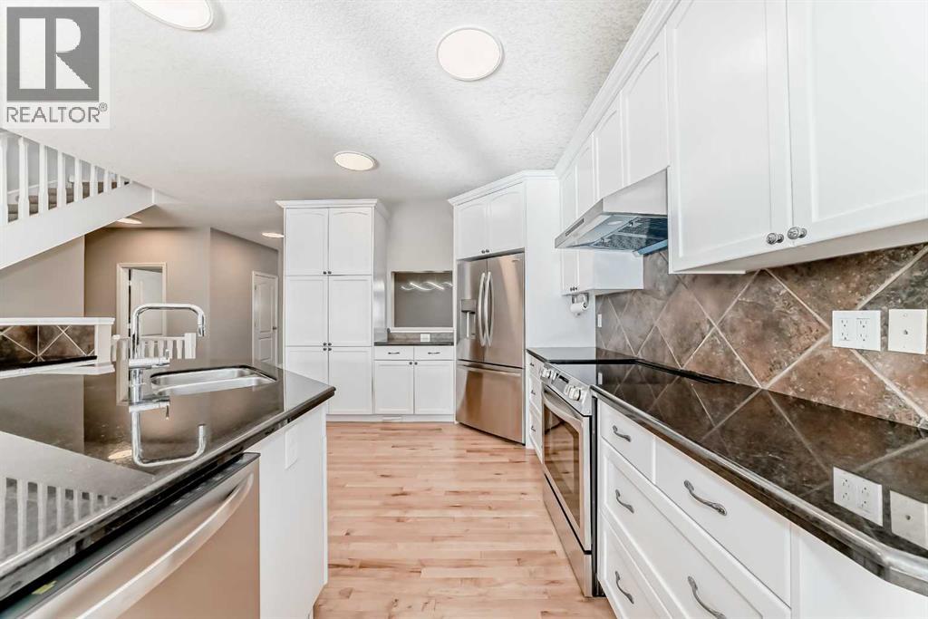 75 Cougar Ridge Heights Sw, Calgary, Alberta  T3H 4X5 - Photo 6 - A2266429