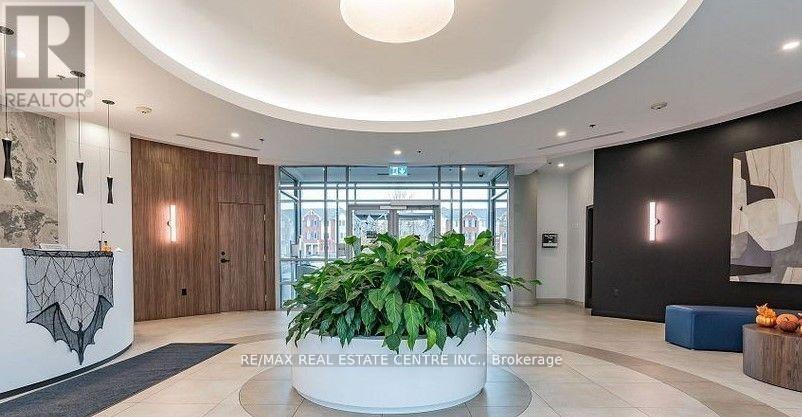 301 - 215 Queen Street E, Brampton, Ontario  L6W 0A9 - Photo 6 - W12477614