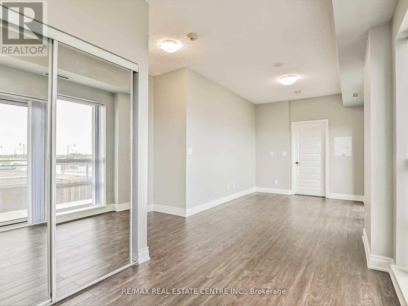 301 - 215 Queen Street E, Brampton, Ontario  L6W 0A9 - Photo 9 - W12477614