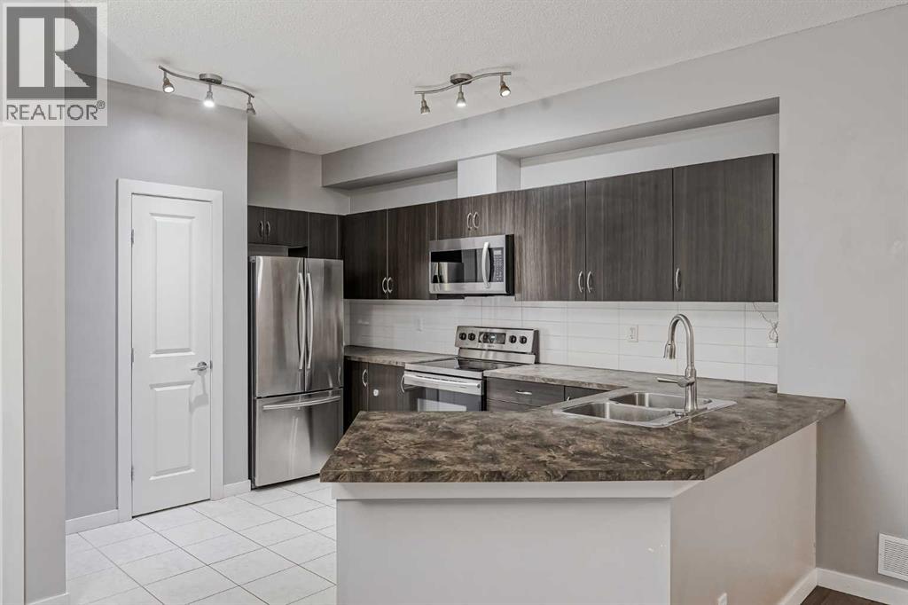 303, 100 Cranfield Common Se, Calgary, Alberta  T3M 1S1 - Photo 4 - A2266207