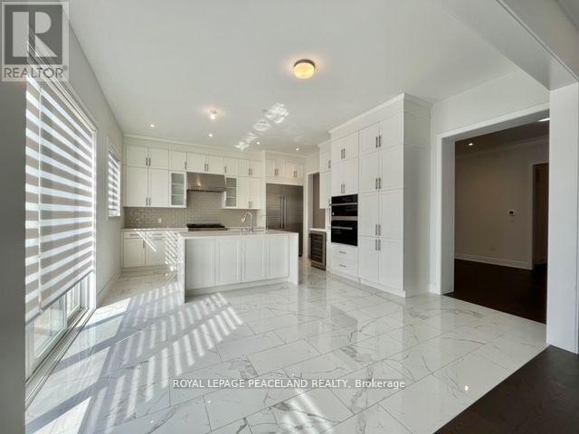 49 Sikura Circle, Aurora, Ontario  L4G 3Y9 - Photo 5 - N12473780