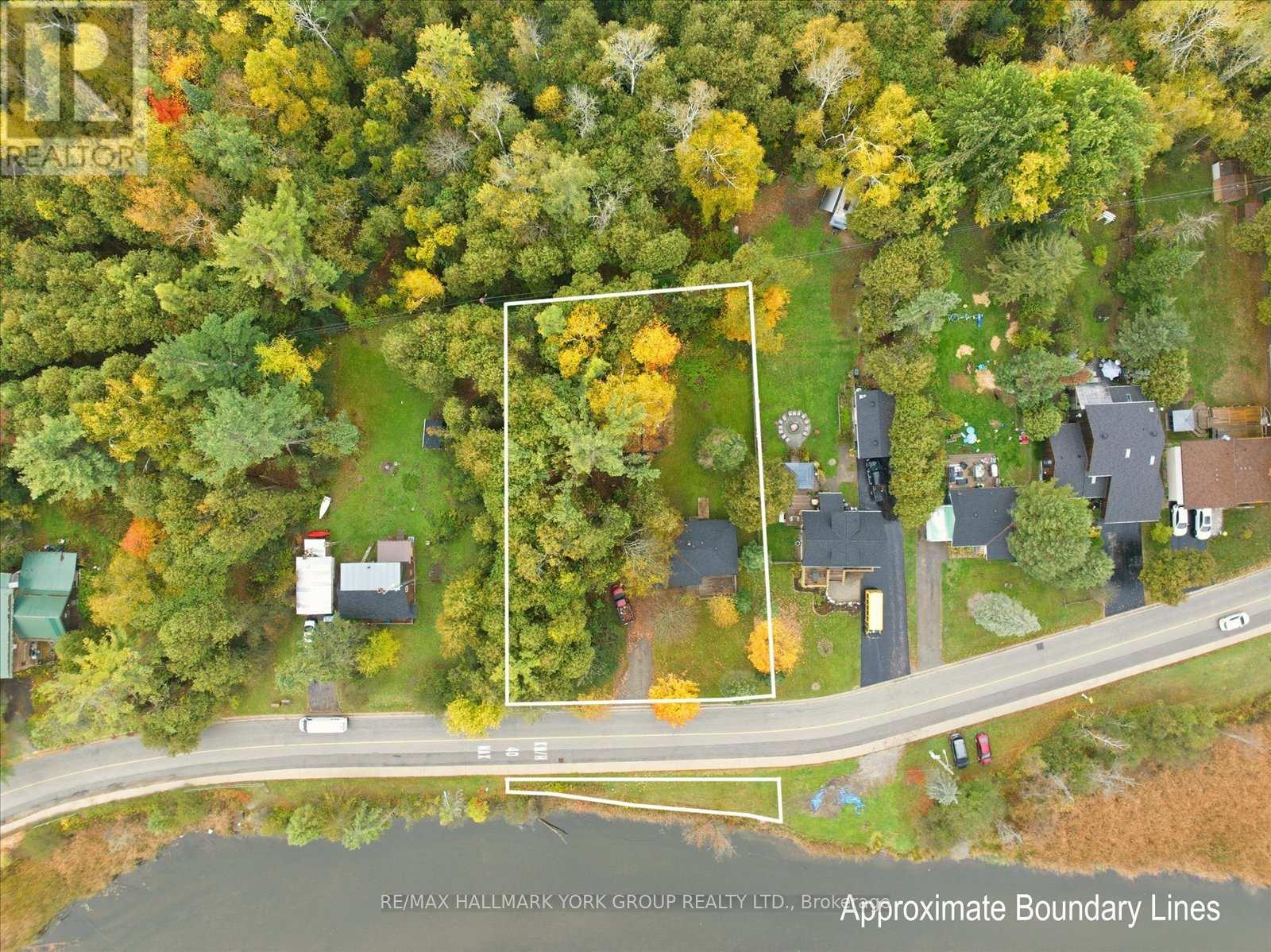 32 Station Road, Georgina, Ontario  L0E 1N0 - Photo 1 - N12473793