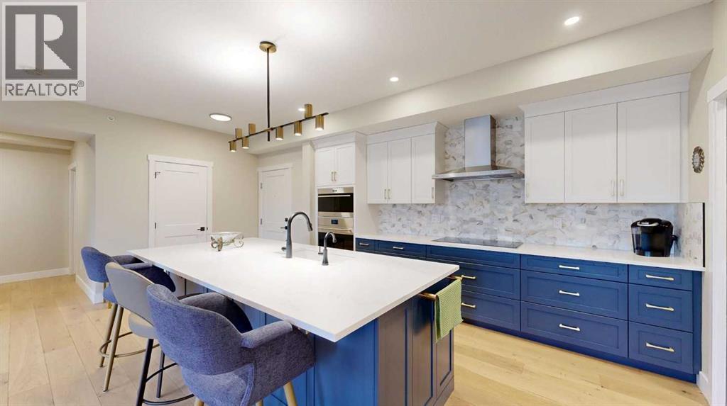 409, 15 Cougar Ridge Landing Sw, Calgary, Alberta  T3H 6C3 - Photo 2 - A2223664