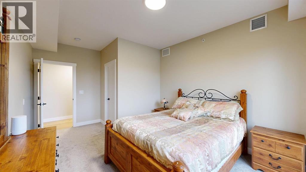 409, 15 Cougar Ridge Landing Sw, Calgary, Alberta  T3H 6C3 - Photo 15 - A2223664